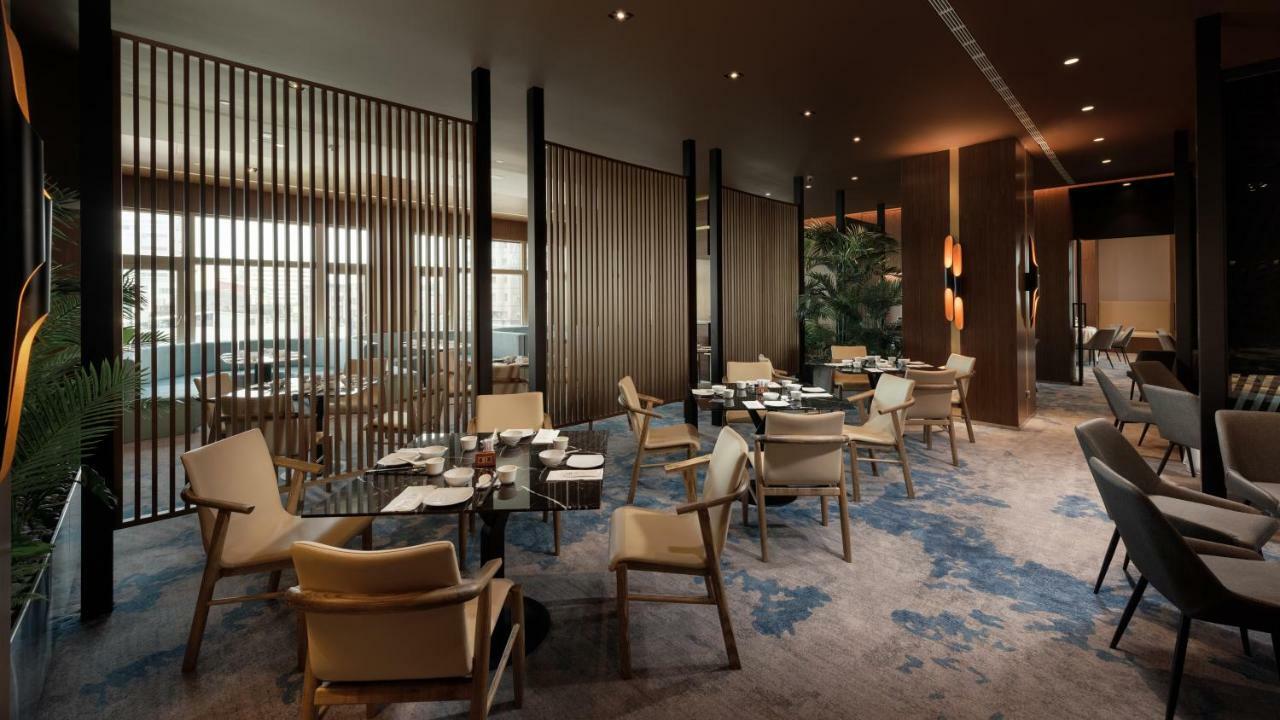 The Howard Plaza Hotel Гаосюн Экстерьер фото The Wing at Hong Kong International Airport