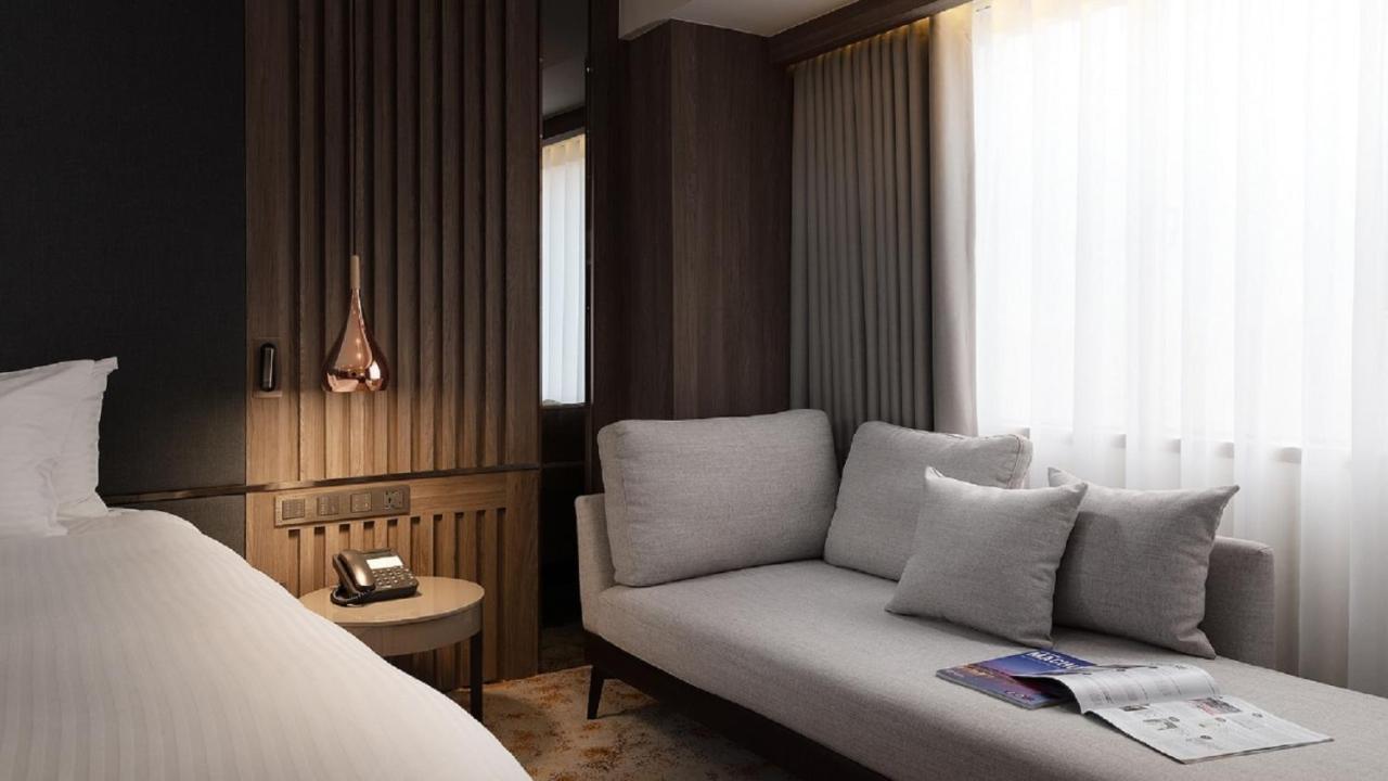 The Howard Plaza Hotel Гаосюн Экстерьер фото A room at the hotel
